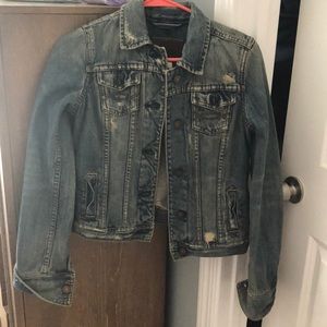 Distressed denim jacket
